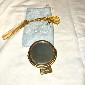 Judith Leiber Gold Mirror and Comb Set with protective bag.